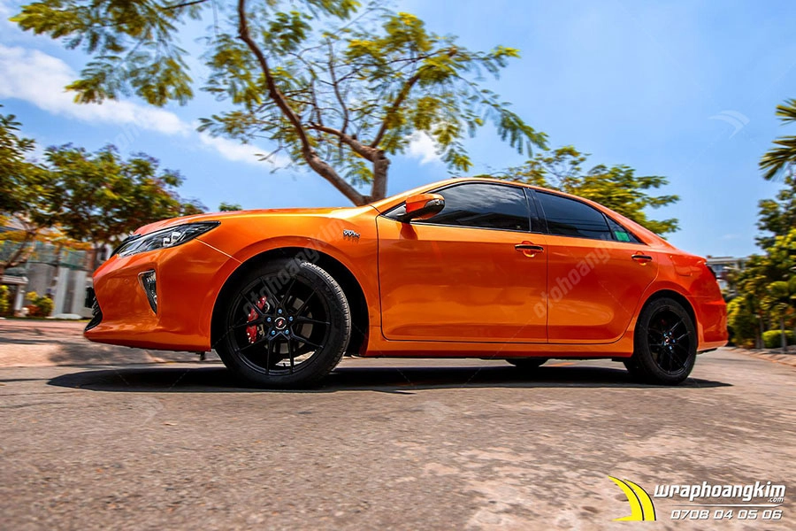 Dán đổi màu Candy cam ma thuật Toyota Camry - Ảnh 1