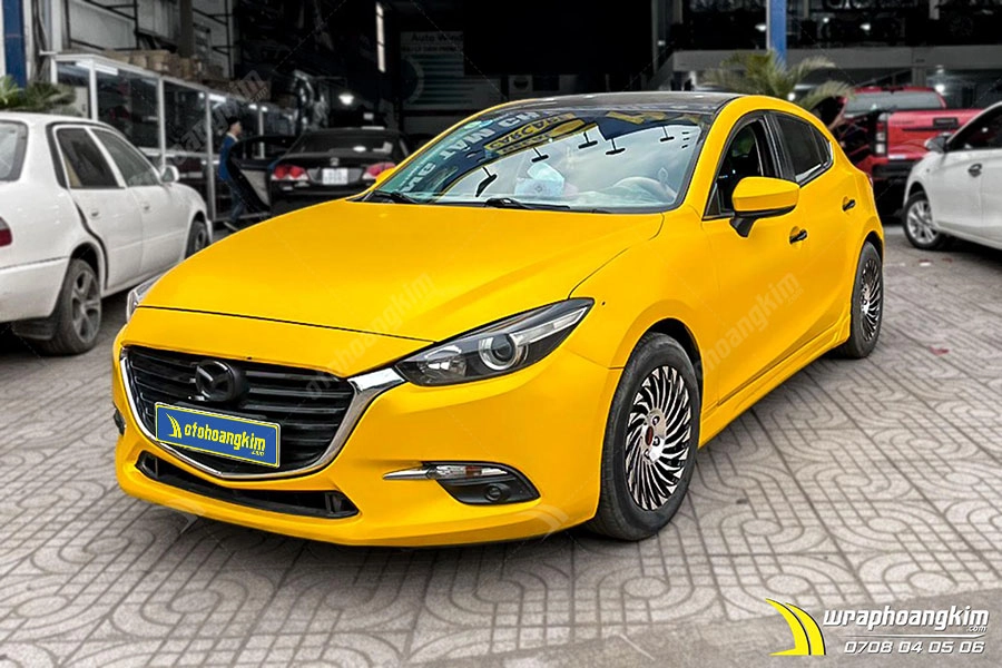 Dán đổi màu vàng mờ Mazda 3 Hatchback - Ảnh 1