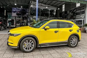 Dán đổi màu Candy vàng Mazda Cx5