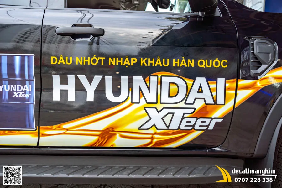 Dán tem quảng cáo xe Ranger mẫu dầu nhớt Hyundai XTeer - Ảnh 1