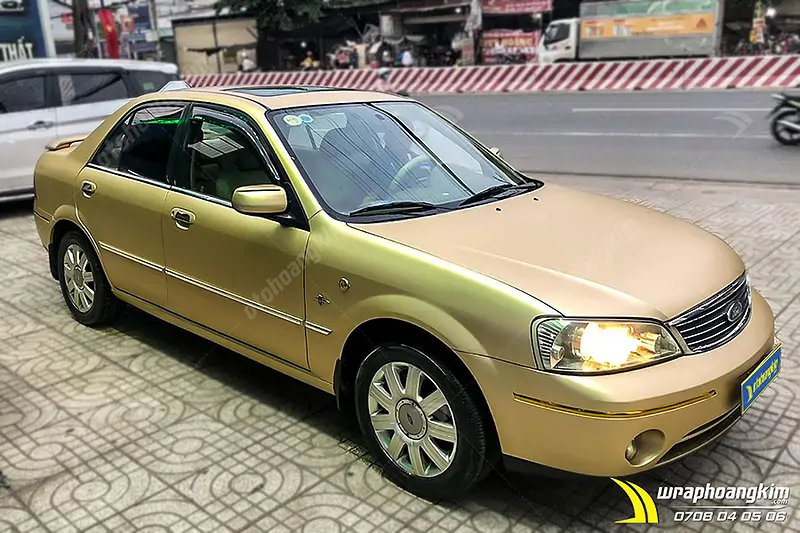 Dán đối màu nâu vàng mờ Ford Laser - Ảnh 4