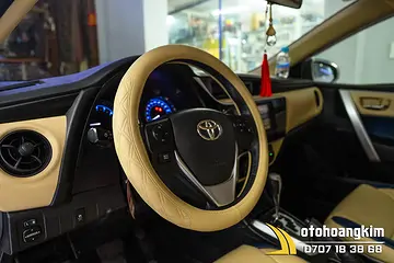 Bọc vô lăng xi màu kem