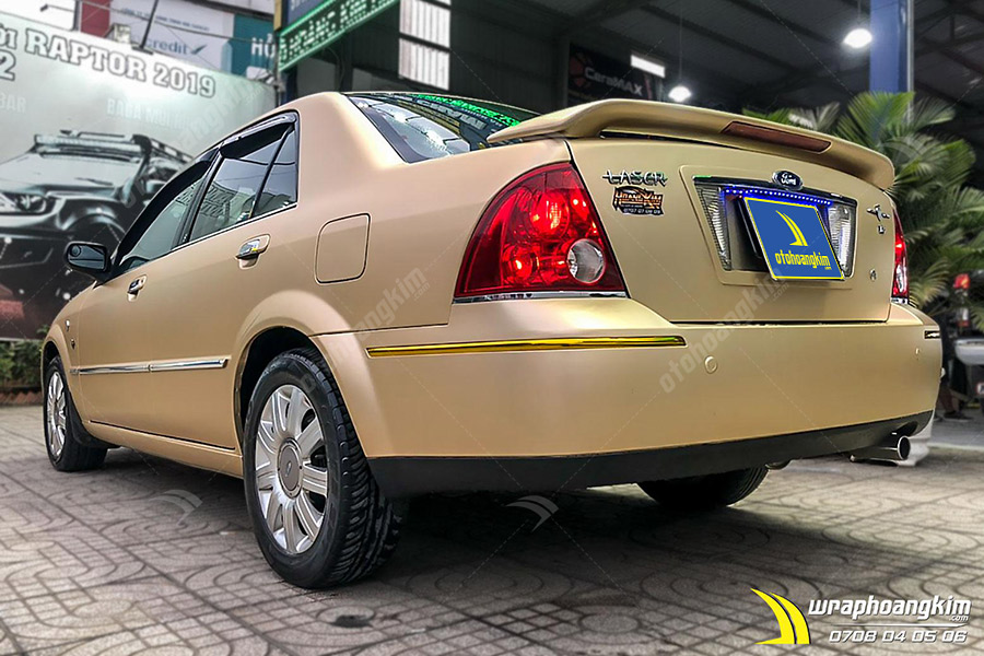 Dán đối màu nâu vàng mờ Ford Laser  ảnh 4