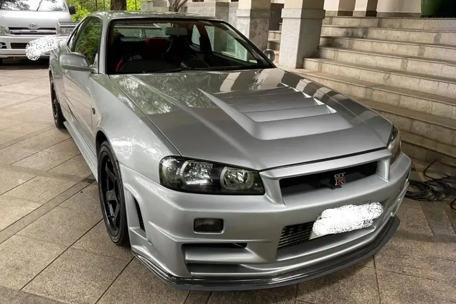 https://otohoangkim-storage.sgp1.cdn.digitaloceanspaces.com/nissan-skyline-gtr-r34-doc-nhat-the-gioi-duoc-ban-voi-gia-2-trie-0-900x900.webp