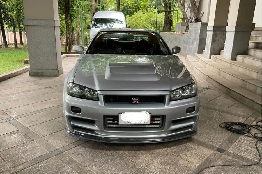 https://otohoangkim-storage.sgp1.cdn.digitaloceanspaces.com/nissan-skyline-gtr-r34-doc-nhat-the-gioi-duoc-ban-voi-gia-2-trie-1-900x900.webp