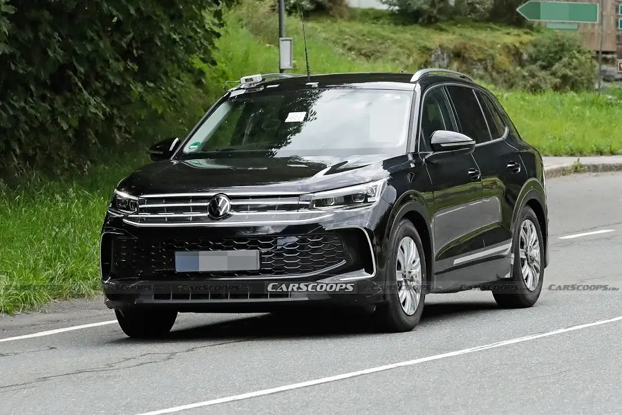 https://otohoangkim-storage.sgp1.cdn.digitaloceanspaces.com/volkswagen-tiguan-2024-the-he-moi-lo-dien-khong-che-chan-0-900x900.webp